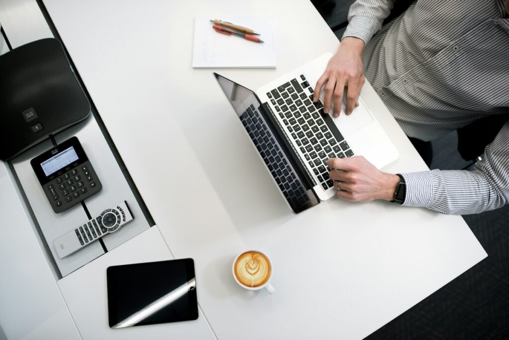 Professional desk and business paperwork representing leased line cost planning