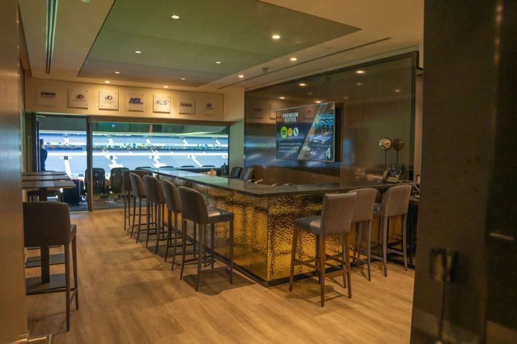 Clubhouse bar and seating area illustrating golf club food and beverage operations